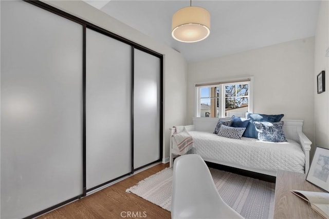 bedroom with wood finished floors