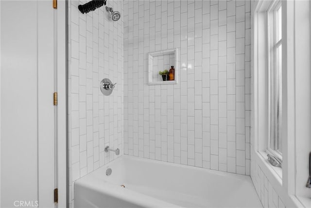 bathroom with washtub / shower combination