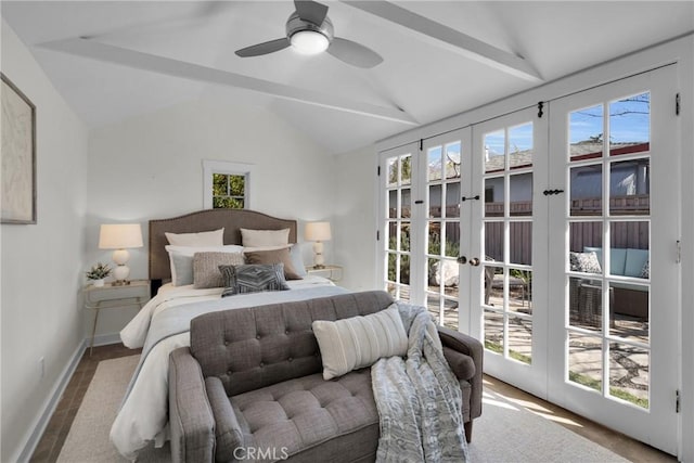 bedroom with french doors, lofted ceiling, multiple windows, and access to outside