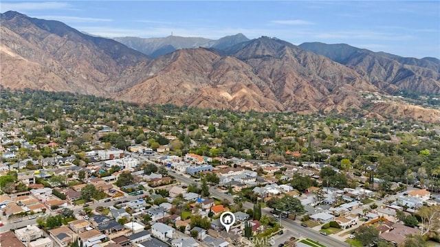 aerial view with a mountain view and a residential view