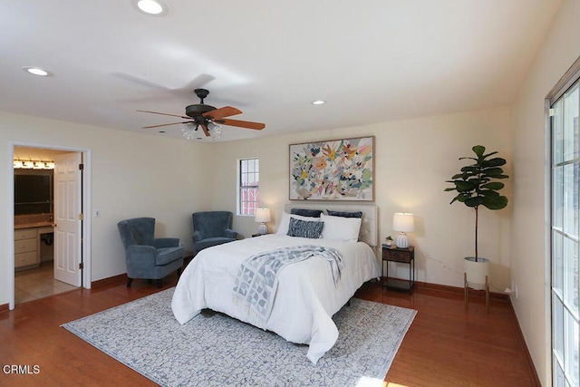 bedroom featuring a ceiling fan, recessed lighting, wood finished floors, and baseboards