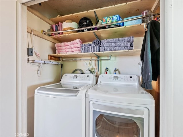 laundry area featuring washer and clothes dryer