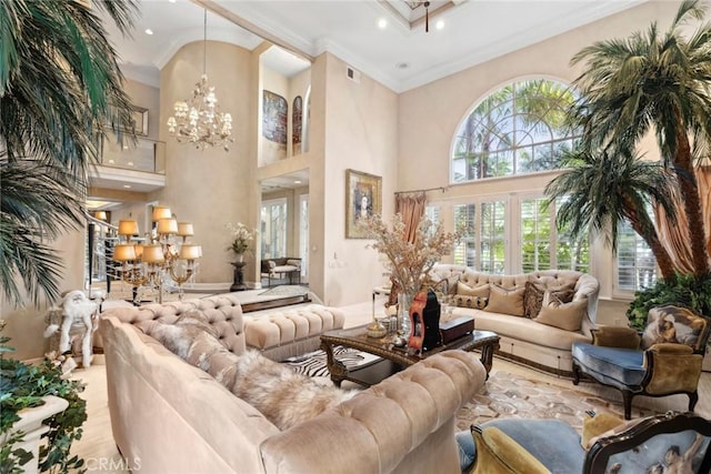 living room with visible vents, ornamental molding, wood finished floors, recessed lighting, and a chandelier