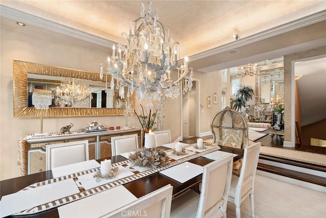 dining area with ornamental molding