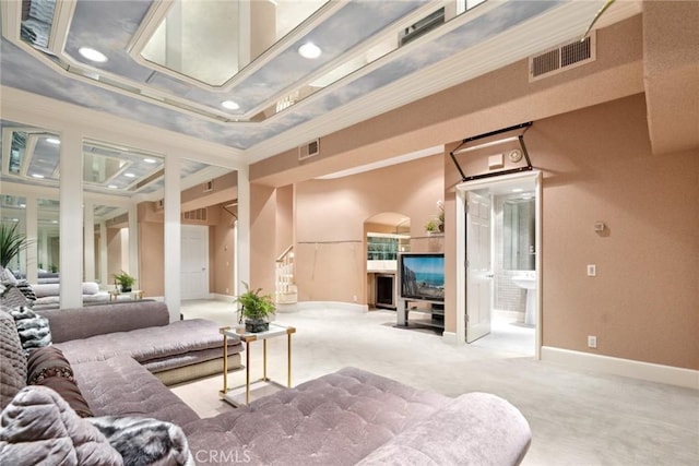 interior space with stairs, visible vents, carpet flooring, and crown molding