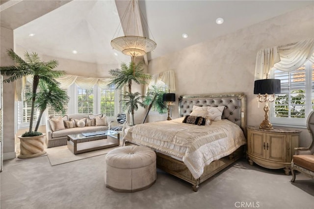 bedroom featuring a towering ceiling, recessed lighting, and carpet floors