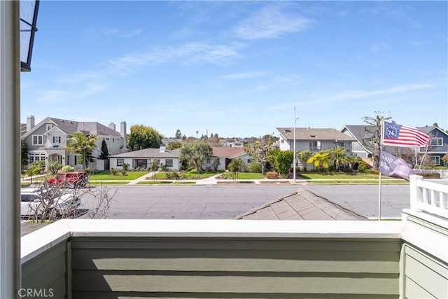 balcony featuring a residential view