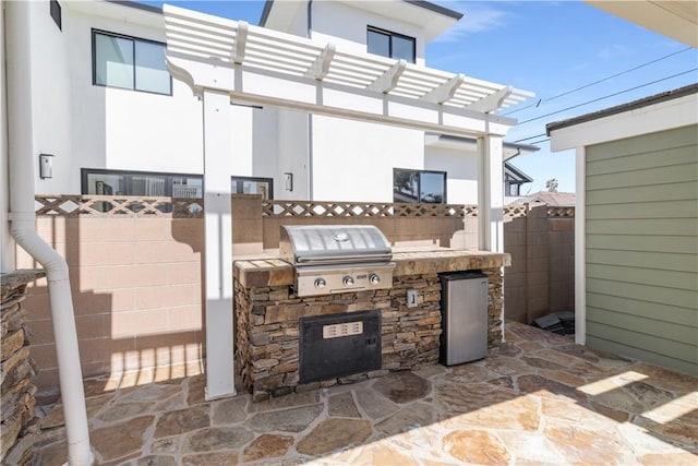 view of patio / terrace featuring grilling area, area for grilling, a pergola, and fence