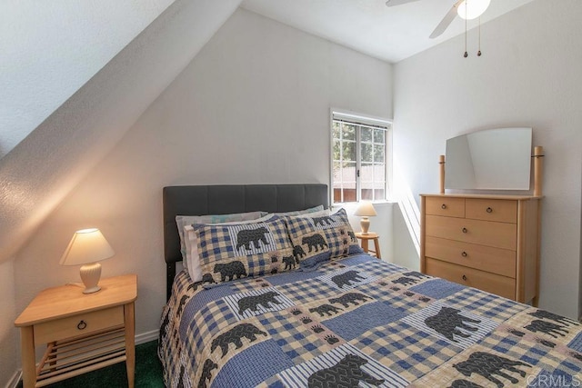 bedroom with a ceiling fan and lofted ceiling