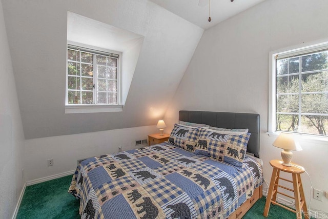 bedroom featuring vaulted ceiling, carpet, visible vents, and baseboards