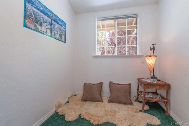 carpeted bedroom with baseboards