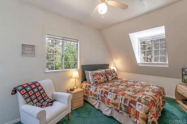 carpeted bedroom with lofted ceiling and ceiling fan