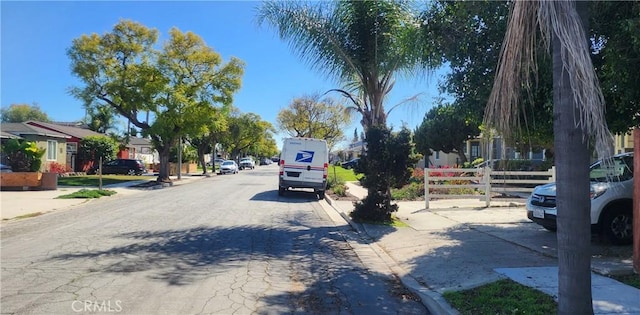 view of road featuring curbs and sidewalks