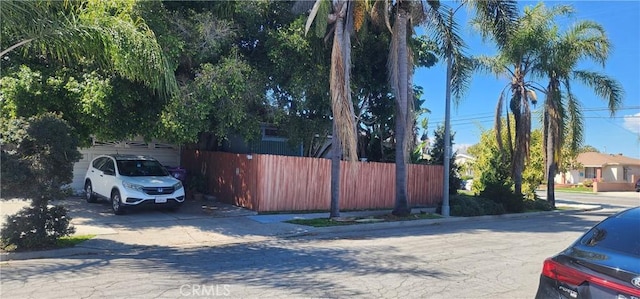 view of street with curbs