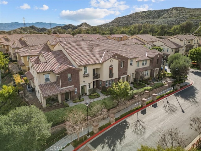 drone / aerial view with a mountain view and a residential view