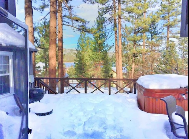 exterior space featuring a hot tub