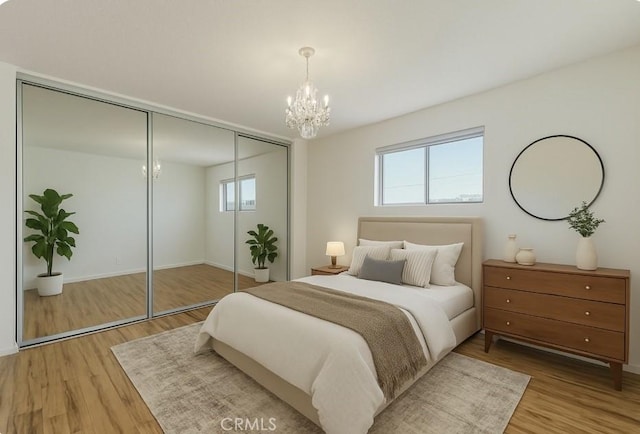 4358 Mammoth Ave Unit 14, Sherman Oaks, CA 91423 - bedroom featuring a chandelier, light wood finished floors, and a closet
