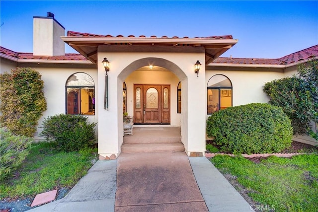 2139 Verde Canyon Rd, Arroyo Grande, CA 93420 - entrance to property featuring stucco siding, a tiled roof, and a chimney