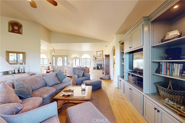 2139 Verde Canyon Rd, Arroyo Grande, CA 93420 - living area featuring arched walkways, light wood finished floors, lofted ceiling, and ceiling fan