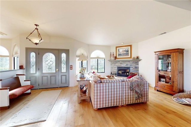 2139 Verde Canyon Rd, Arroyo Grande, CA 93420 - living room featuring light wood-style floors and a stone fireplace