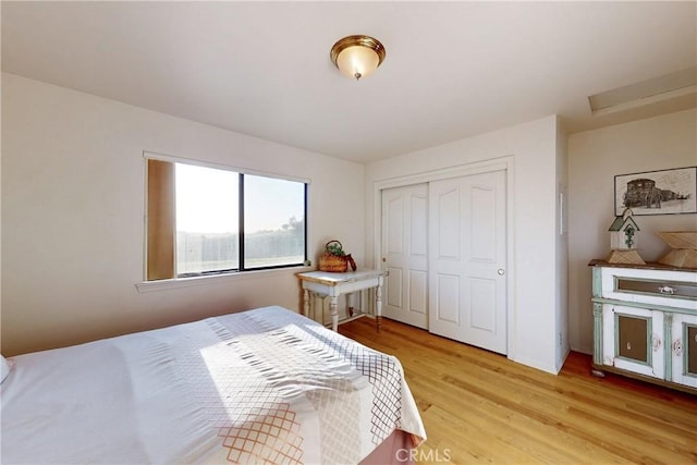 2139 Verde Canyon Rd, Arroyo Grande, CA 93420 - bedroom with light wood-style floors, attic access, and a closet