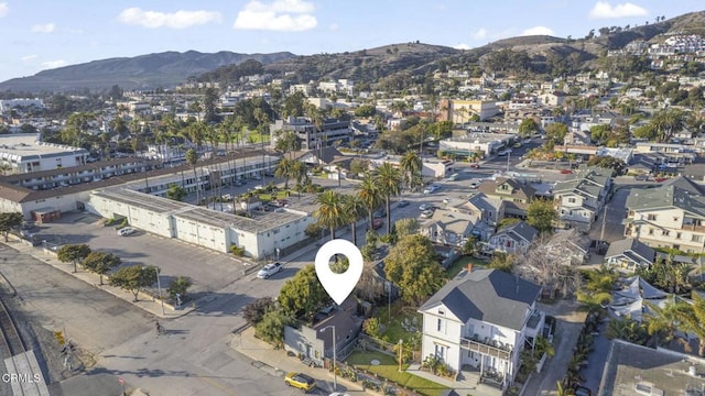 drone / aerial view featuring a mountain view and a residential view