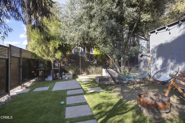 view of yard featuring a patio and a fenced backyard