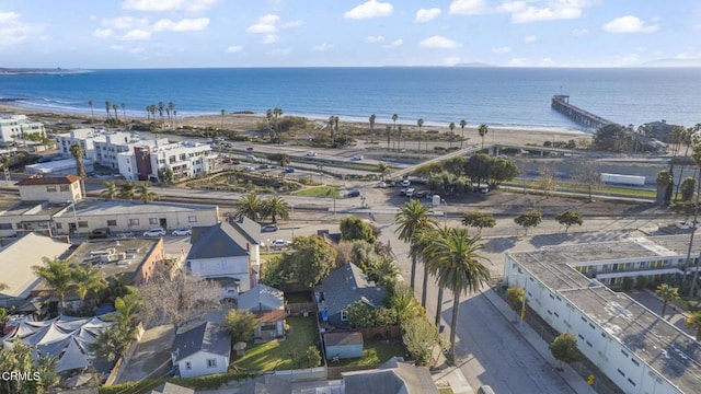 bird's eye view featuring a water view and a view of the beach