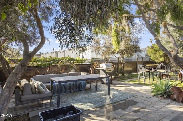 view of patio featuring grilling area and a fenced backyard