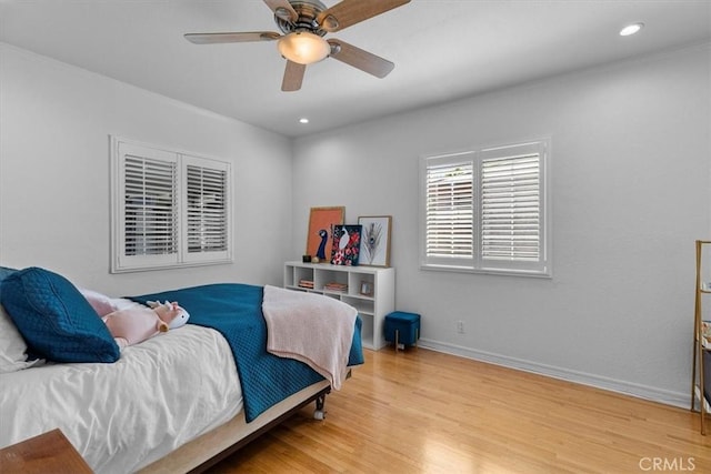 bedroom with recessed lighting, ceiling fan, baseboards, and wood finished floors