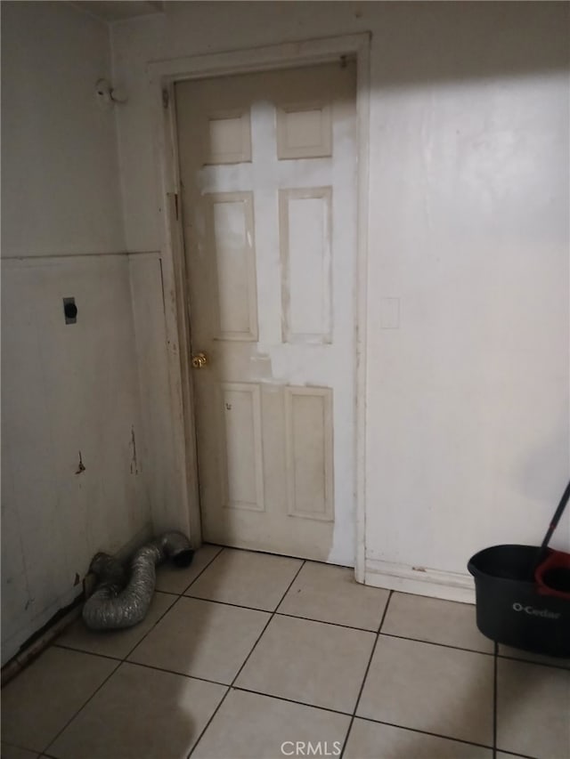 interior space featuring light tile patterned floors