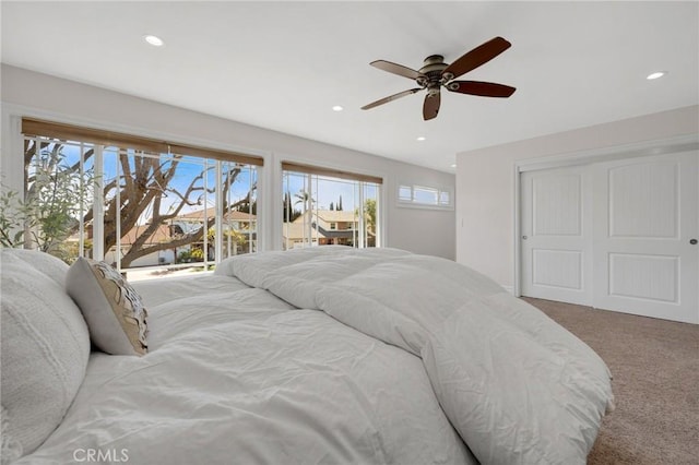 carpeted bedroom with access to exterior, recessed lighting, and ceiling fan