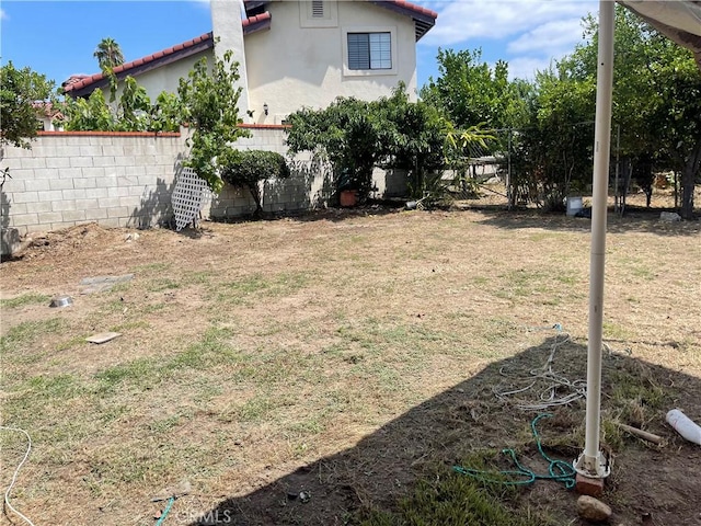 view of yard with fence