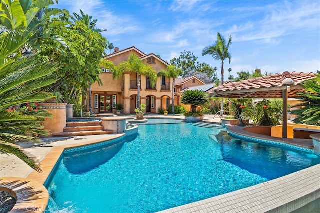 pool with a patio, french doors, and a pergola