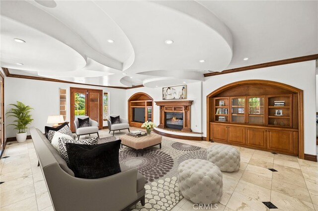 805 E Chase Dr, Corona, CA 92881 - living room featuring recessed lighting, baseboards, crown molding, and a glass covered fireplace