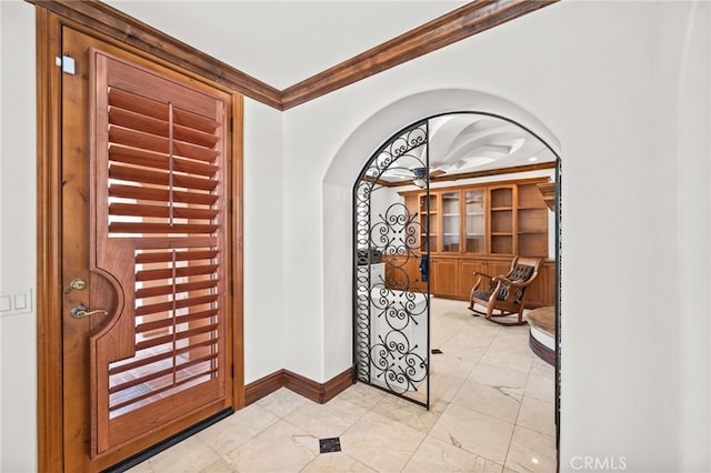 805 E Chase Dr, Corona, CA 92881 - foyer featuring crown molding, arched walkways, and baseboards