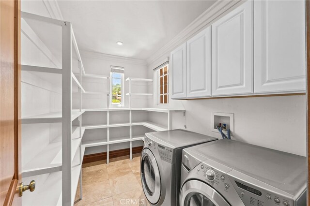 805 E Chase Dr, Corona, CA 92881 - laundry area featuring ornamental molding, cabinet space, and independent washer and dryer