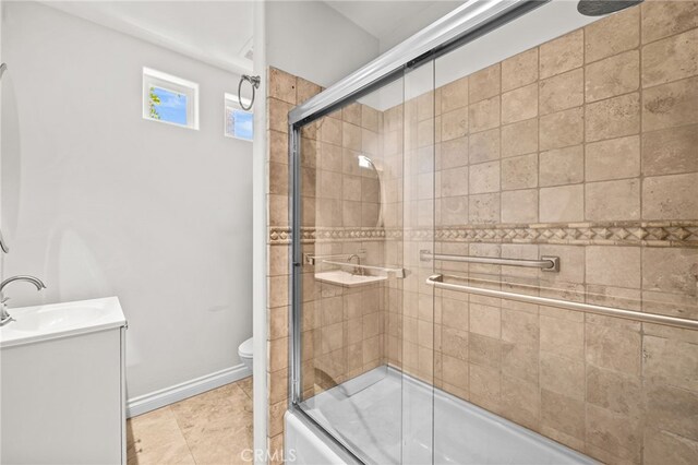 805 E Chase Dr, Corona, CA 92881 - full bathroom featuring vanity, enclosed tub / shower combo, baseboards, and toilet