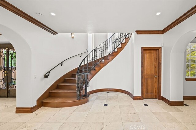 805 E Chase Dr, Corona, CA 92881 - stairway with recessed lighting, baseboards, ornamental molding, and arched walkways