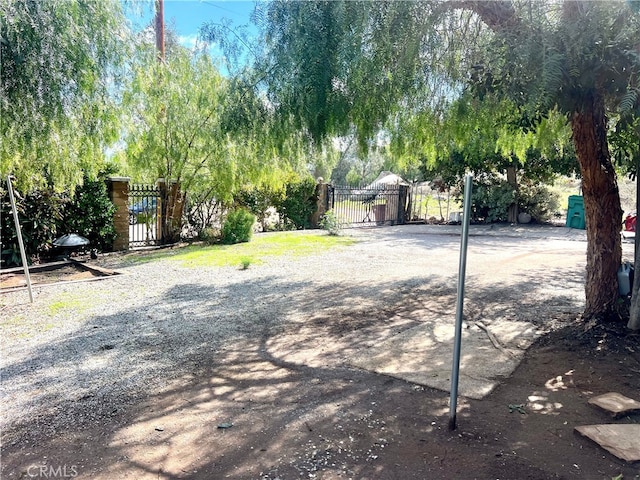 view of yard featuring a gate and fence