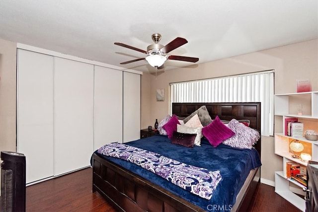 bedroom with a closet, ceiling fan, and wood finished floors