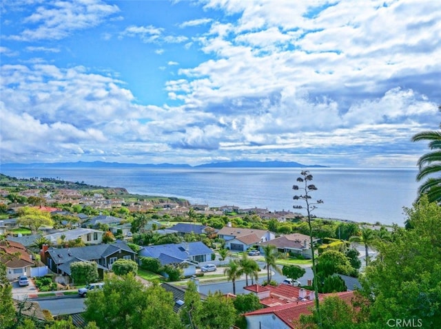 aerial view featuring a water view and a residential view