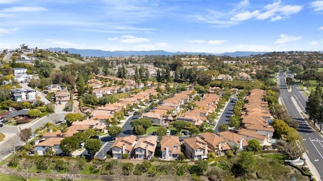 aerial view with a mountain view and a residential view