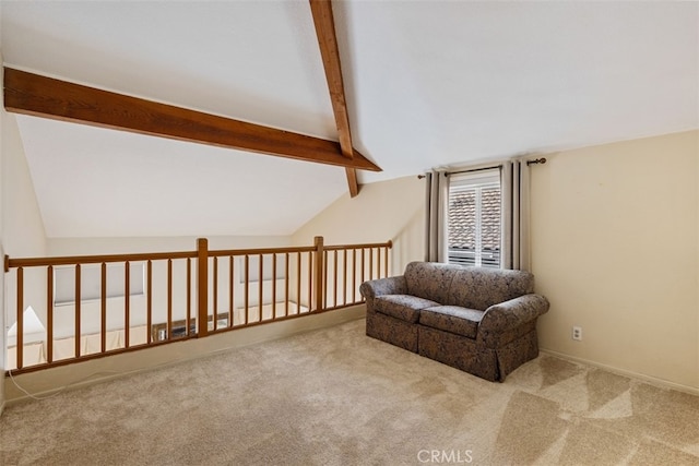 living area with vaulted ceiling with beams and carpet floors