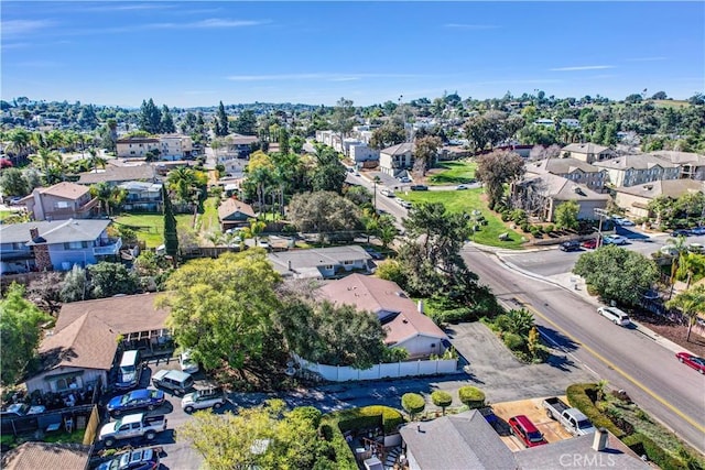 birds eye view of property with a residential view