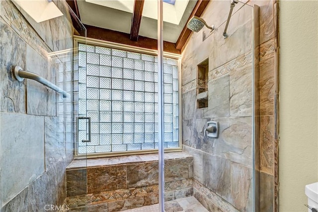 full bath featuring a tile shower