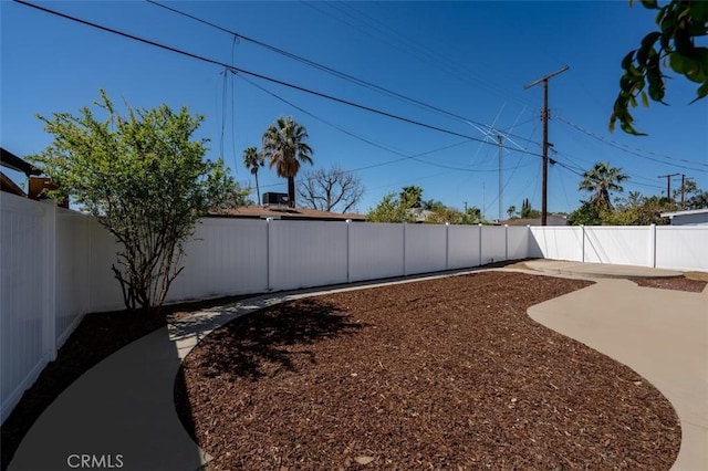 view of yard featuring a fenced backyard and a patio area