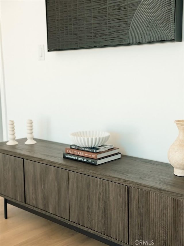 interior details featuring wood finished floors