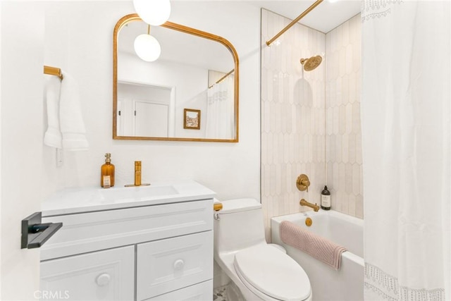 bathroom featuring vanity, toilet, and shower / bathtub combination with curtain