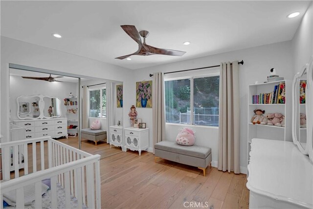 bedroom featuring recessed lighting, light wood finished floors, and ceiling fan